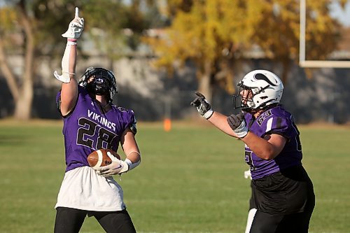 Brayden Smith of the Vincent Massey Vikings throws a finger up to the sky while celebrating a touchdown in tribute to the late Greg Steeves a WHSFL game against the River East Kodiaks at Doug Steeves Field on a beautiful Friday afternoon. (Tim Smith/The Brandon Sun)