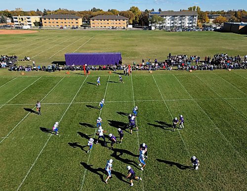 The Vincent Massey Vikings and the River East Kodiaks cast shadows as they go head-to-head in Massey's last WHSFL home game. (Tim Smith/The Brandon Sun)