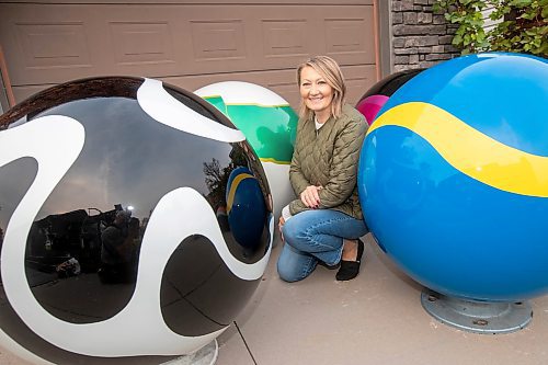 BROOK JONES/FREE PRESS
Erica Swendrowski is pictured with giant fibreglass marbles in her driveway in Winnipeg, Man., Thursday, Oct. 10, 2024. The local artist and landscape dsesigner is refurbishing the marbles she created as a public art piece dubbed Marbles at Mayfair which is a City of Winnipeg Public Art Collection.