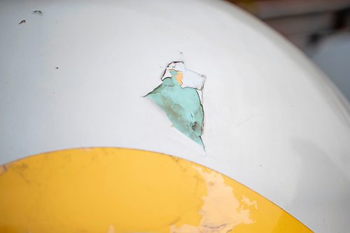 BROOK JONES/FREE PRESS
An older fibreglass marble with damage which was created by Erica Swendrowski s pictured in Winnipeg, Man., Thursday, Oct. 10, 2024. The local artist and landscape dsesigner is refurbishing smilar giant fibreglass marbles she created as a public art piece dubbed Marbles at Mayfair which is a City of Winnipeg Public Art Collection.