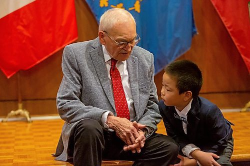 BROOK JONES/FREE PRESS
The Winnipeg Boys Choir is celebrating its centennial this year. Winnipeg Boys Choir alumni Jim Shephered (left), who sang in the choir from 1942 to 1945, is pictured visiting with the choir's youngest member Oakley Guo at at Government House in Winnipeg, Man., Thursday, Oct. 10, 2024. The local choir performed for Manitoba Lt.-Gov. Anita Neville in celebration of their centennial milestone.