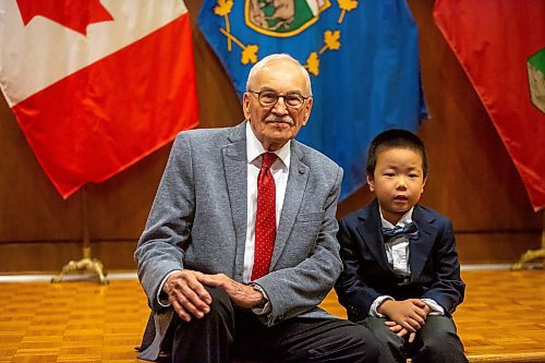 BROOK JONES/FREE PRESS
The Winnipeg Boys Choir is celebrating its centennial this year. Winnipeg Boys Choir alumni Jim Shephered (left), who sang in the choir from 1942 to 1945, is pictured with the choir's youngest member Oakley Guo at at Government House in Winnipeg, Man., Thursday, Oct. 10, 2024. The local choir performed for Manitoba Lt.-Gov. Anita Neville in celebration of their centennial milestone.