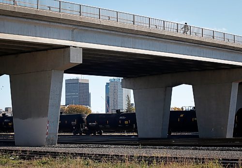 JOHN WOODS / FREE PRESS
A cyclist crosses the Salter Street Bridge to get over the rail-yard in downtown Winnipeg Monday, October 14, 2024. 

Reporter: ?