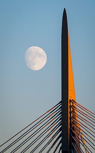 JOHN WOODS / FREE PRESS
The rising moon is photographed with the Esplanade Riel in Winnipeg Monday, October 14, 2024. 

Reporter: ?