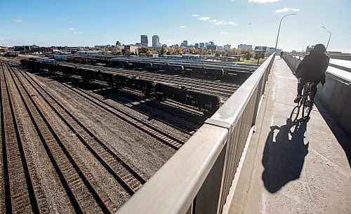 JOHN WOODS / FREE PRESS
A cyclist crosses the Salter Street Bridge to get over the rail-yard in downtown Winnipeg Monday, October 14, 2024. 

Reporter: ?