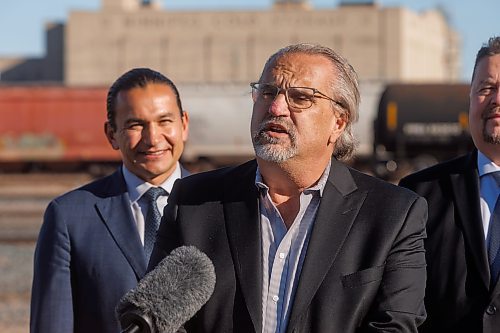 MIKE DEAL / FREE PRESS
Mike Pyle, chair, Business Council of Manitoba, speaks after Premier Wab Kinew announces that his government has selected selecting Lloyd Axworthy as study lead to determine the feasibility of relocating Winnipeg&#x2019;s rail lines, during a press conference at the edge of the Canadian Pacific Railway rail yards, Tuesday morning.
Reporter: Chris Kitching
241015 - Tuesday, October 15, 2024.