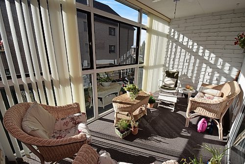 Todd Lewys / Free Press
Accessed via a sliding patio door on the living room&#x2019;s rear wall, the enclosed balcony is a lovely space ideal for entertaining or kicking back with a good book.