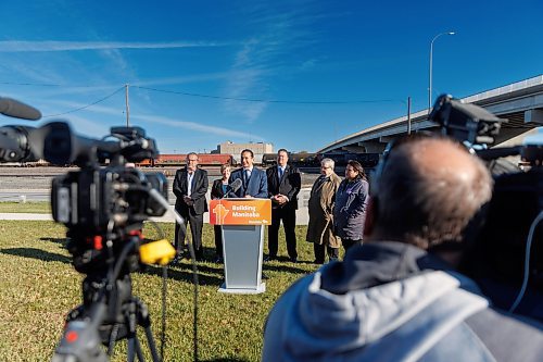 MIKE DEAL / FREE PRESS
Premier Wab Kinew announces that his government has selected selecting Lloyd Axworthy as study lead to determine the feasibility of relocating Winnipeg&#x2019;s rail lines, during a press conference at the edge of the Canadian Pacific Railway rail yards, Tuesday morning.
Reporter: Chris Kitching
241015 - Tuesday, October 15, 2024.