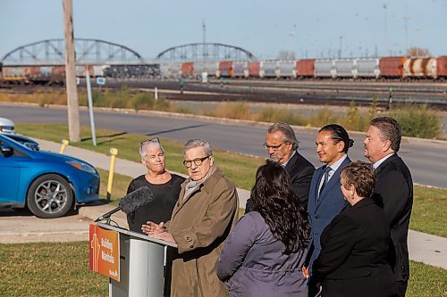 MIKE DEAL / FREE PRESS
Premier Wab Kinew announces that his government has selected selecting Lloyd Axworthy as study lead to determine the feasibility of relocating Winnipeg&#x2019;s rail lines, during a press conference at the edge of the Canadian Pacific Railway rail yards, Tuesday morning.
Reporter: Chris Kitching
241015 - Tuesday, October 15, 2024.