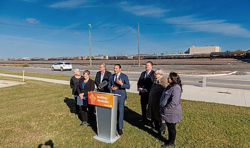 MIKE DEAL / FREE PRESS
Premier Wab Kinew announces that his government has selected selecting Lloyd Axworthy as study lead to determine the feasibility of relocating Winnipeg&#x2019;s rail lines, during a press conference at the edge of the Canadian Pacific Railway rail yards, Tuesday morning.
Reporter: Chris Kitching
241015 - Tuesday, October 15, 2024.