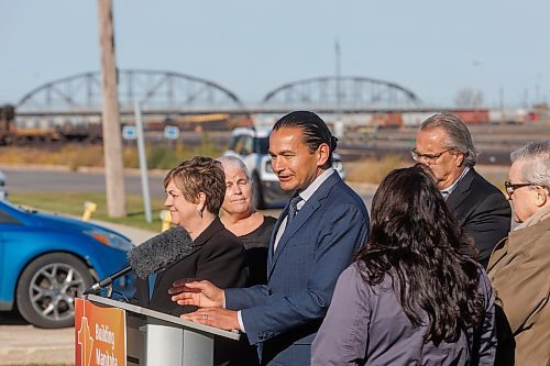 MIKE DEAL / FREE PRESS
Premier Wab Kinew announces that his government has selected selecting Lloyd Axworthy as study lead to determine the feasibility of relocating Winnipeg&#x2019;s rail lines, during a press conference at the edge of the Canadian Pacific Railway rail yards, Tuesday morning.
Reporter: Chris Kitching
241015 - Tuesday, October 15, 2024.