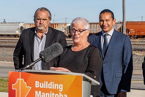 MIKE DEAL / FREE PRESS
Kate Kehler, executive director, Social Planning Council of Winnipeg, speaks after Premier Wab Kinew announces that his government has selected selecting Lloyd Axworthy as study lead to determine the feasibility of relocating Winnipeg&#x2019;s rail lines, during a press conference at the edge of the Canadian Pacific Railway rail yards, Tuesday morning.
Reporter: Chris Kitching
241015 - Tuesday, October 15, 2024.