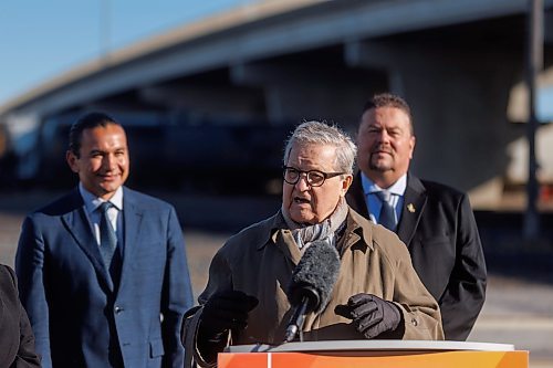 MIKE DEAL / FREE PRESS
Premier Wab Kinew announces that his government has selected selecting Lloyd Axworthy as study lead to determine the feasibility of relocating Winnipeg&#x2019;s rail lines, during a press conference at the edge of the Canadian Pacific Railway rail yards, Tuesday morning.
Reporter: Chris Kitching
241015 - Tuesday, October 15, 2024.