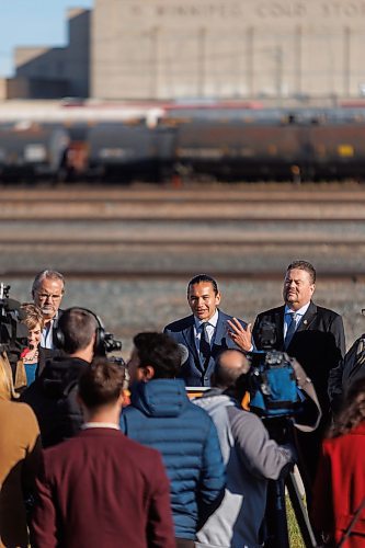 MIKE DEAL / FREE PRESS
Premier Wab Kinew announces that his government has selected selecting Lloyd Axworthy as study lead to determine the feasibility of relocating Winnipeg&#x2019;s rail lines, during a press conference at the edge of the Canadian Pacific Railway rail yards, Tuesday morning.
Reporter: Chris Kitching
241015 - Tuesday, October 15, 2024.