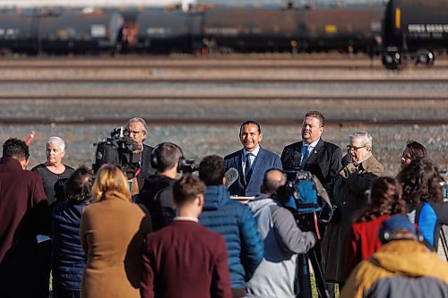 MIKE DEAL / FREE PRESS
Premier Wab Kinew announces that his government has selected selecting Lloyd Axworthy as study lead to determine the feasibility of relocating Winnipeg&#x2019;s rail lines, during a press conference at the edge of the Canadian Pacific Railway rail yards, Tuesday morning.
Reporter: Chris Kitching
241015 - Tuesday, October 15, 2024.