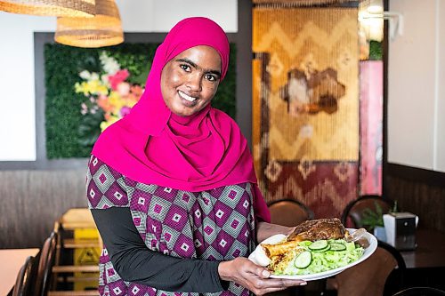 MIKAELA MACKENZIE / FREE PRESS
	
Sucad Mahamad with the lamb shank and rice at Som Legacy Restaurant on Tuesday, Oct. 15, 2024.

For Eva story.
Winnipeg Free Press 2024