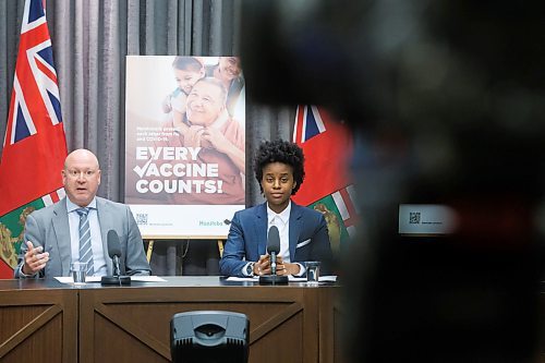 MIKE DEAL / FREE PRESS
Health, Seniors and Long-Term Care Minister Uzoma Asagwara and Dr. Brent Roussin, chief provincial public health officer, hold a press conference urging Manitobans to get their flu and COVID19 vaccine booster shots, Wednesday morning at the Manitoba Legislative building.
Reporter: Maggie Macintosh
241016 - Wednesday, October 16, 2024.