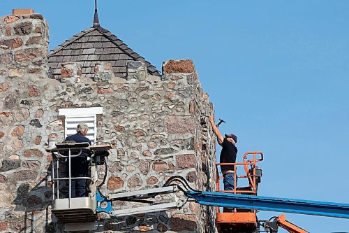 15102024
Rudy Leroy with Leroy Masonry and Rocky Siemens with Siemens Construction work on replacing wood vents on St. Mary&#x2019;s Anglican Church in Virden. Construction of the stone church began in 1892. 
(Tim Smith/The Brandon Sun) 