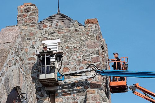 15102024
Rudy Leroy with Leroy Masonry and Rocky Siemens with Siemens Construction work on replacing wood vents on St. Mary&#x2019;s Anglican Church in Virden. Construction of the stone church began in 1892. 
(Tim Smith/The Brandon Sun) 