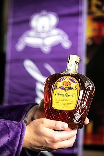 MIKAELA MACKENZIE / FREE PRESS
Marc Andre holds a bottle from his Crown Royal whisky collection.