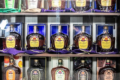 MIKAELA MACKENZIE / FREE PRESS 
As collector Marc Andre became increasingly infatuated by the sheer volume of Crown Royal memorabilia, he began converting his rec room into a shrine to his favourite spirit.