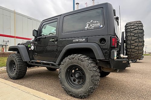 A side shot of Jim Miscavish’s black 2015 Jeep Wrangler JK Sport with Nitto Mud Grappler tires that are 35 x 12.5 x 16 inches on Black Rock rims. (Michele McDougall/The Brandon Sun)