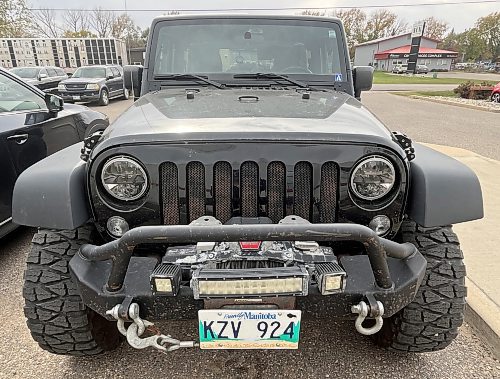 The front grill on Jim Miscavish’s black 2015 Jeep Wrangler JK Sport. (Michele McDougall/The Brandon Sun)