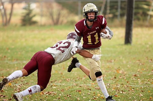 17102024
Quarterback Simon Leckie #11 of the Crocus Plainsmen runs the ball during high school football action against the St. Paul&#x2019;s Crusaders at CPRSS on a warm Thursday. 
(Tim Smith/The Brandon Sun)