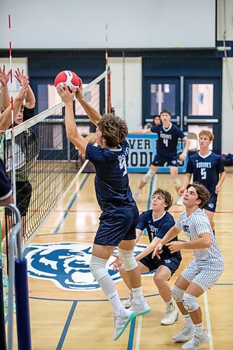 BROOK JONES / FREE PRESS
The River East Kodiaks varsity boys volleyball team earned a victory over the visiting Garden City Gophers in three straight sets (26-24, 25-14, 25-18-) in AAAA KPAC Tier 1 volleyball action at River East Collegiate in Winnipeg, Man., Wednesday, Oct. 16, 2024. Pictured: River East Kodiaks left-side hitter Eli Ulrich (No. 9) controls the volleyball.