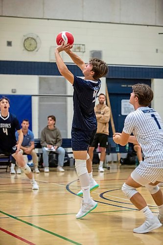 BROOK JONES / FREE PRESS
The River East Kodiaks varsity boys volleyball team earned a victory over the visiting Garden City Gophers in three straight sets (26-24, 25-14, 25-18-) in AAAA KPAC Tier 1 volleyball action at River East Collegiate in Winnipeg, Man., Wednesday, Oct. 16, 2024. Pictured: River East Kodiaks left-side hitter Eli Ulrich (No. 9) controls the volleyball.