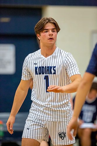 BROOK JONES / FREE PRESS
The River East Kodiaks varsity boys volleyball team earned a victory over the visiting Garden City Gophers in three straight sets (26-24, 25-14, 25-18-) in AAAA KPAC Tier 1 volleyball action at River East Collegiate in Winnipeg, Man., Wednesday, Oct. 16, 2024. Pictured: River East Kodiaks libero Gavin Ulrich gives a low five to a teammate.