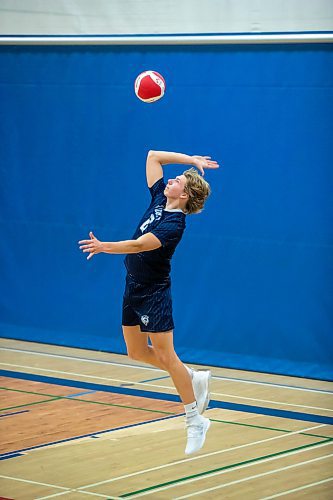 BROOK JONES / FREE PRESS
The River East Kodiaks varsity boys volleyball team earned a victory over the visiting Garden City Gophers in three straight sets (26-24, 25-14, 25-18-) in AAAA KPAC Tier 1 volleyball action at River East Collegiate in Winnipeg, Man., Wednesday, Oct. 16, 2024. Pictured: River East Kodiaks Tanner Naghtigall (No. 8), who plays middle, serves the volleyball during the third set.