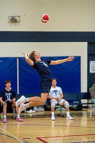 BROOK JONES / FREE PRESS
The River East Kodiaks varsity boys volleyball team earned a victory over the visiting Garden City Gophers in three straight sets (26-24, 25-14, 25-18-) in AAAA KPAC Tier 1 volleyball action at River East Collegiate in Winnipeg, Man., Wednesday, Oct. 16, 2024. Pictured: River East Kodiaks Tanner Naghtigall (No. 8), who plays middle, serves the volleyball during the second set.