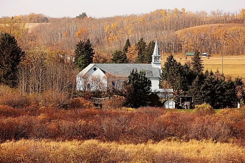 17102024
St. Elizabeth of Hungary Church in Polonia, Manitoba stands out against the fall colours in the valley on a warm 
Thursday.
(Tim Smith/The Brandon Sun)