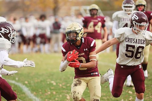 17102024
Seth McCauley #8 of the Crocus Plainsmen runs the ball during high school football action against the St. Paul&#x2019;s Crusaders at CPRSS on a warm Thursday. 
(Tim Smith/The Brandon Sun)