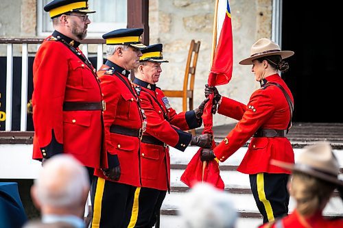 MIKAELA MACKENZIE / FREE PRESS
	
Scott McMurchy, new commanding officer of the Manitoba RCMP, is given the divisional pipe banner by sargent Morgan Page during the Manitoba RCMP ceremonial transfer of command from Rob Hill to Scott McMurchy at Lower Fort Garry National Historic Site on Thursday, Oct. 17, 2024.

Standup.
Winnipeg Free Press 2024