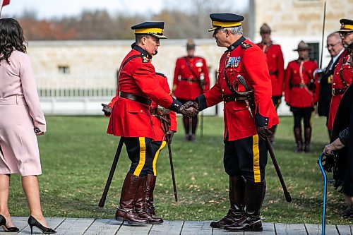 MIKAELA MACKENZIE / FREE PRESS
	
Scott McMurchy, new commanding officer of the Manitoba RCMP, shakes hands with commissioner Mike Duheme during the Manitoba RCMP ceremonial transfer of command from Rob Hill to Scott McMurchy at Lower Fort Garry National Historic Site on Thursday, Oct. 17, 2024.

Standup.
Winnipeg Free Press 2024