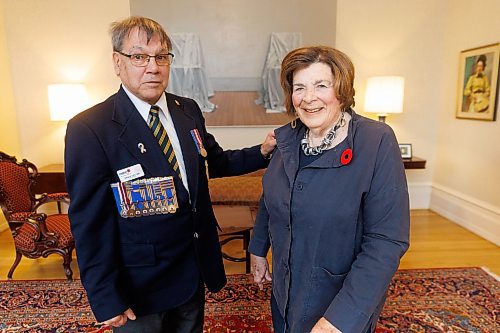 MIKE DEAL / FREE PRESS
Lt.-Gov. Anita R. Neville is presented with the first poppy of this year&#x2019;s annual Royal Canadian Legion fundraiser at Government House, 10 Kennedy St. by Comrade Ernie Tester, president, Royal Canadian Legion Provincial Command, Friday morning.
241018 - Friday, October 18, 2024.