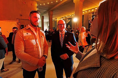 MIKE DEAL / FREE PRESS
Jared Carrington, President Carrington Real Estate and Winnipeg Mayor Scott Gillingham chat with Kate Fenske, CEO of Downtown Winnipeg BIZ, after the ceremony Carrington Real Estate held to celebrate their new efforts to complete the 185 Donald Street tower located at the corner of Donald Street and St. Mary Avenue, Friday afternoon.
241018 - Friday, October 18, 2024.