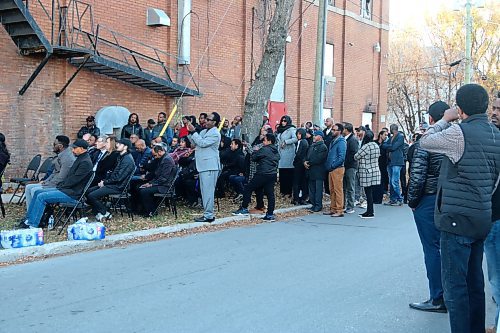 NICOLE BUFFIE / FREE PRESS The crowd gathered outside the House of Covenant church on Saturday.