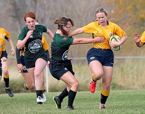 Brandon Bobcats' Shaina Beswitherick breaks a University of Saskatchewan Huskies tackle during their Prairie University Women's Rugby Conference match at John Reilly Field on Saturday. Brandon won 107-7 to clinch a playoff spot. (Thomas Friesen/The Brandon Sun)