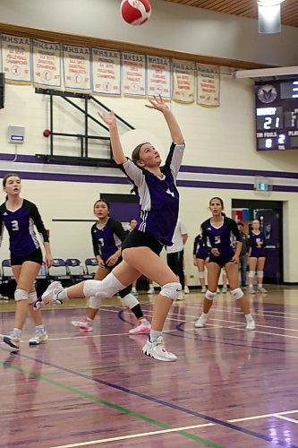 Ayla Church makes a tough set on the run during as the Vincent Massey Vikings play the Virden Bears in the final of the Viking Classic JV girls' volleyball tournament on Saturday. Massey swept the final 2-0. (Thomas Friesen/The Brandon Sun)