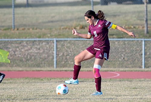 Kiyanna Arevalo settles a pass during the Assiniboine College Cougars women's soccer match against the Canadian Mennonite University Blazers at the Sportsplex field on Saturday. The Cougars lost 3-0, falling out of Manitoba Colleges Athletic Conference playoff contention. (Thomas Friesen/The Brandon Sun)