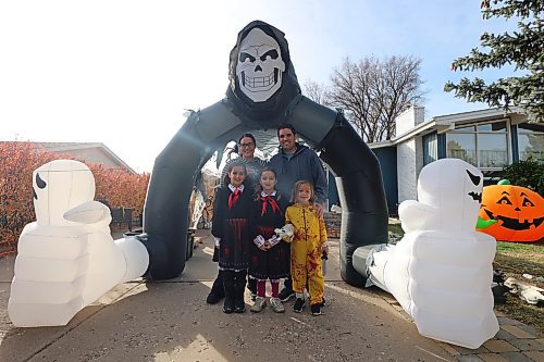 Carla and Mike Mitchell and their daughters Emma, Claire and Hannah show off their haunted house called "Cedar Hollow" on Sunday morning. The family will servr up scares on Oct. 25, 26, 27 and 31 in exchange for food donations for Samaritan House Ministries. (Colin Slark/The Brandon Sun)