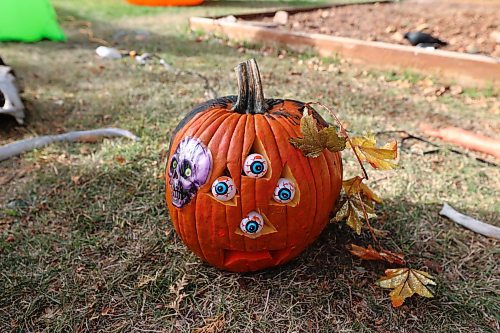 A distressed-looking four-eyed pumpkin glares at visitors to the Cedar Hollow haunted house. (Colin Slark/The Brandon Sun)