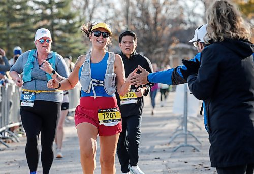 JOHN WOODS / FREE PRESS
People cross the finish line at the WFPS Run at the Canadian Mennonite University Sunday, October 20, 2024. 

Reporter: s/u