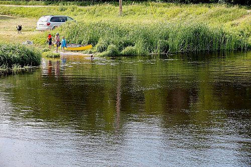 JOHN WOODS / WINNIPEG FREE PRESS
People use the Brokenhead River along highway 44 just east of Beausejour Tuesday, July 26, 2022. Pipe is being laid along 44 and will be used to to transfer waste water from the town&#x2019;s water treatment plant and into the Brokenhead River.

Re: Macintosh