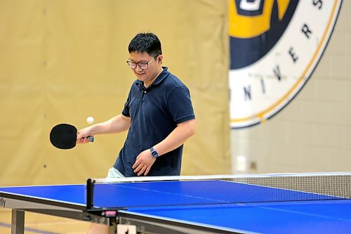 More than 50 table tennis players of various ages gathered at Brandon University's Healthy Living Centre on Saturday to compete in singles and doubles tournaments as part of the Manitoba Table Tennis Association's MBLL Assiniboine Open event. Organizers said it was the biggest table tennis event held in Brandon in years. See Page A2 for the story. (Colin Slark/The Brandon Sun)