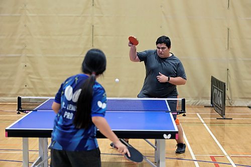 More than 50 table tennis players of various ages gathered at Brandon University's Healthy Living Centre on Saturday to compete in singles and doubles tournaments as part of the Manitoba Table Tennis Association's MBLL Assiniboine Open event. Organizers said it was the biggest table tennis event held in Brandon in years. (Colin Slark/The Brandon Sun)