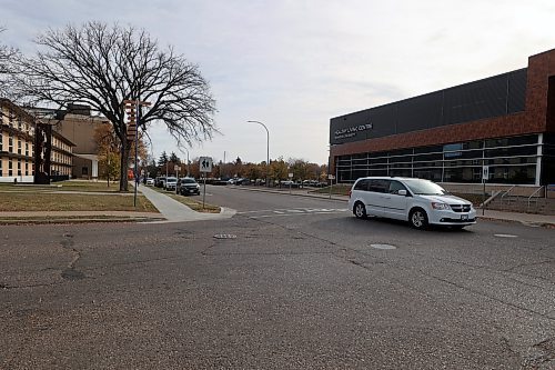 A car drives through the intersection of Louise Avenue and 20th Street in front Brandon University's Healthy Living Centre on Sunday afternoon. A bylaw receiving first reading at Monday's Brandon City Council meeting would see the speed limit on those roads as they go through BU campus be reduced to 30 km/h. (Colin Slark/The Brandon Sun)